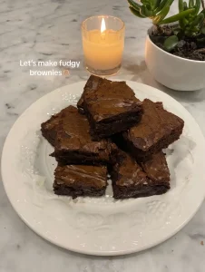 Ultra fudgy chocolate brownies with rich chocolate chunks and a silky, fudgy texture