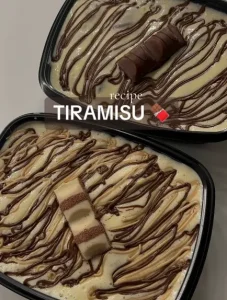 Classic creamy tiramisu with soft soaked cookies and a lush mascarpone garnish